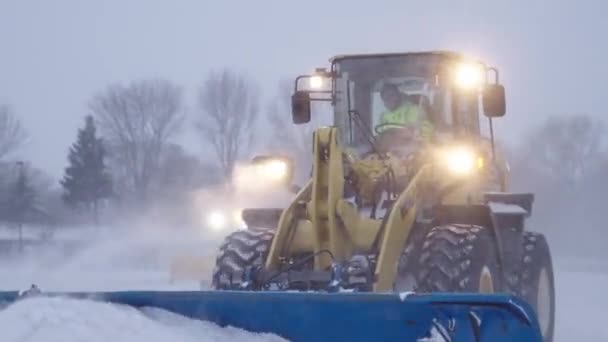 Municipal Worker Driving Snow Plow Tractor Clear Thick Snow Blizzard — Video