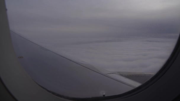 Airplane Window View Clouds Flying Commercial Plane — Stockvideo