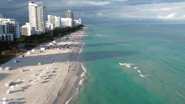 Aerial Drone View People Parasols Waves Miami Beach Sunny Florida — Stock video