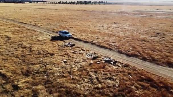 Pickup Truck Driving Dusty Dirt Road California Aerial Pullback — Stock Video