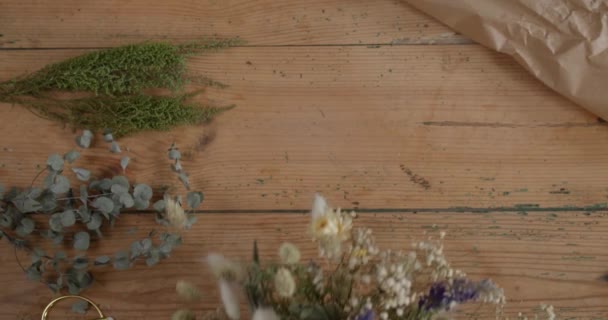 White Purple Dried Flowers Bouquet Being Placed Table Static Top — Stock Video