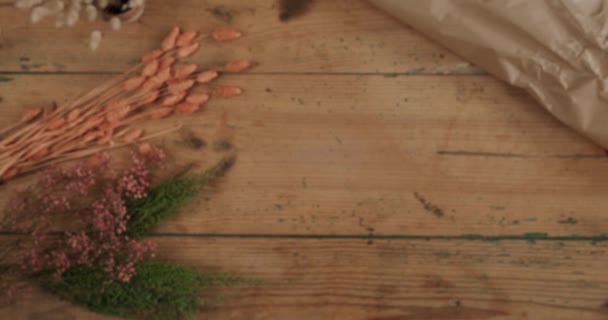 Static Top View Shot Colorful Dried Flower Arrangement Being Placed — Stock Video