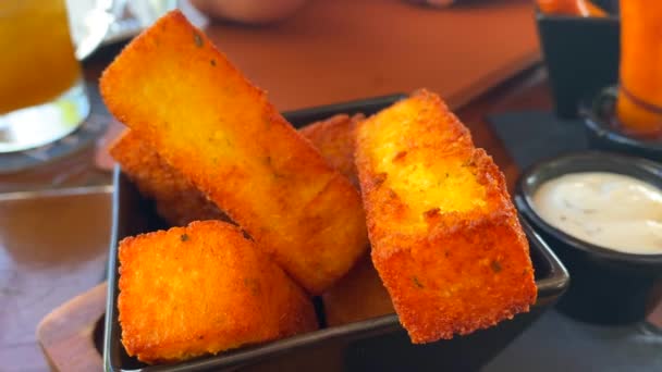 Female Hand Dipping Sauce Deep Fried Cheese Sticks Polenta Chips — Vídeo de Stock