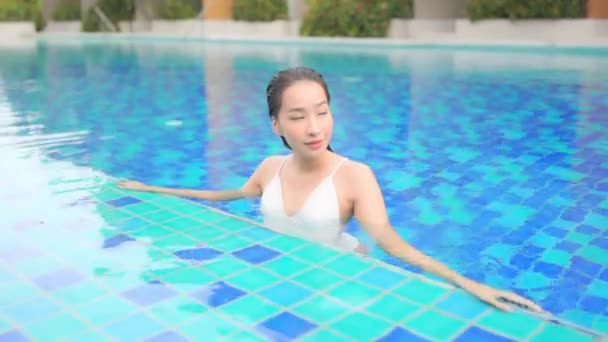 Asian Woman White Bathing Suit Standing Edge Clear Blue Swimming — Stock Video