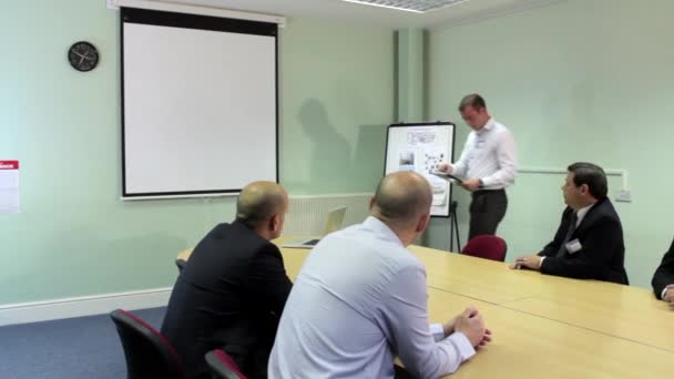 Dolly Shot Businessman Giving Presentation Boardroom Colleagues Business Meeting — Vídeo de stock