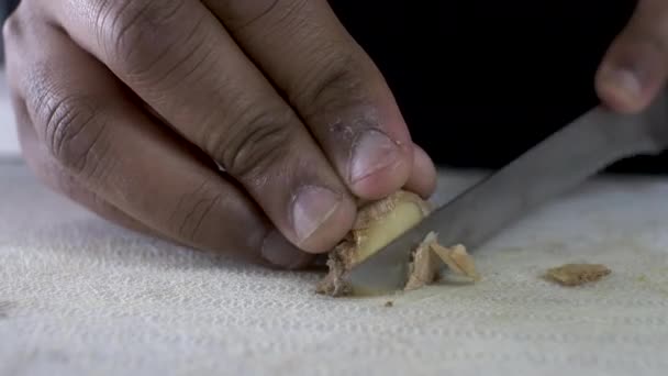Hand Ethnic Minority Adult Male Using Serrated Knife Peel Skin — стокове відео
