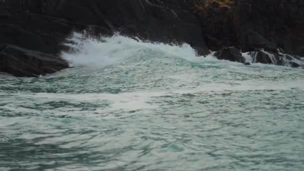 Powerful Waves Crashing Rocks Slow Motion Pan Follow — Stockvideo