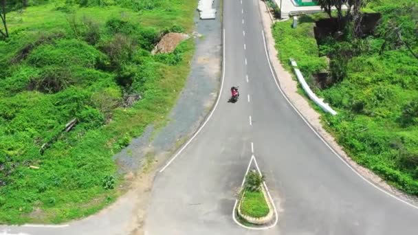 Aerial View Heterosexual Couple Riding Black Bike Empty Concrete Gray — Video