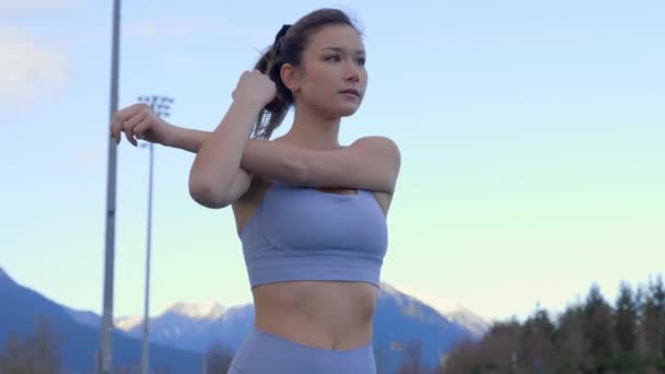 Young Asian Woman Stretching Arm Body Blue Evening Sky Slow — Vídeo de Stock