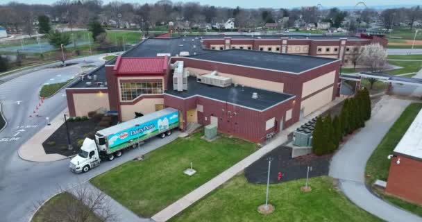 Milk Delivery Truck Unloads Dairy Products Dock School Building Usa — Stockvideo