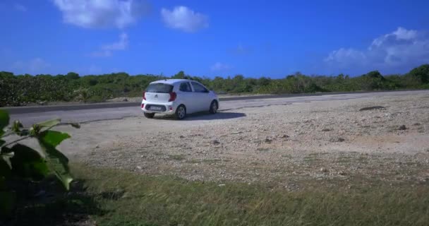 Car Driving Leaving Roadside Stopping Place White Car Driving Away — стоковое видео