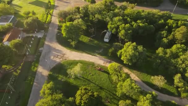 Red Tractor Lawnmower Mows Lawn Park Rotating Aerial View — Vídeo de Stock