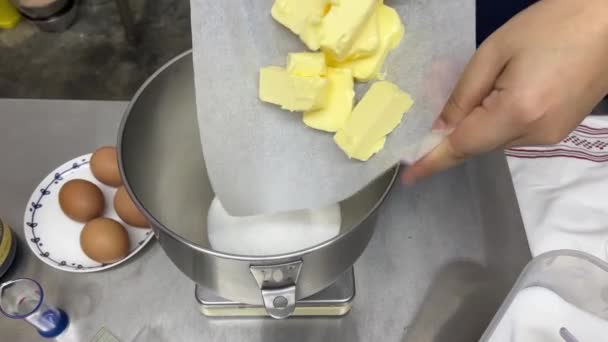 Adding Precisely Measured Butter Mixing Bowl Caster Sugar Baking Recipe — Stok video