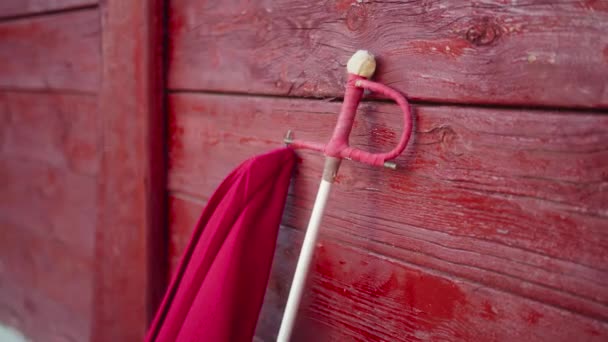 Bullfighter Sword Muleta Red Wooden Wall Close Handheld — ストック動画