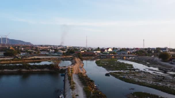 Cityscape Polluted River Environment Vietnam Aerial Flying Backwards — Stok Video