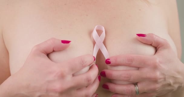 Closeup Topless Woman Hands Covering Her Breasts Pink Ribbon Placed — Vídeo de Stock