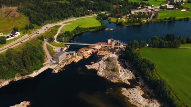 Aerial View Rising Away Sunlit Dam Summer Norway Pull Back — стоковое видео