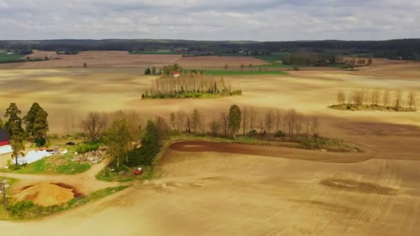 Aerial View Tractor Plowing Spring Fields Rural Scandinavia Circling Drone — Stock Video