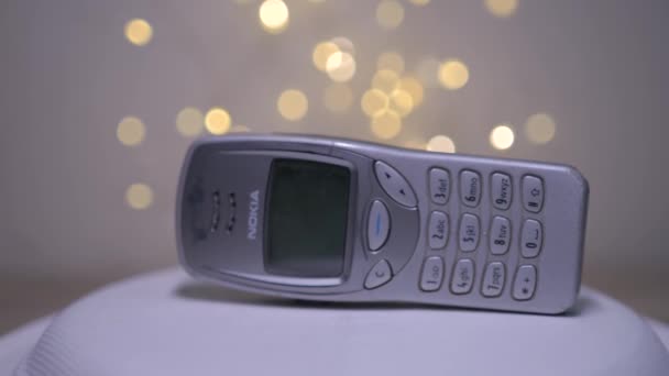 Obsolete Retro Reliable Analogue Classic Nokia Mobile Phone Rotates Isolated — стоковое видео