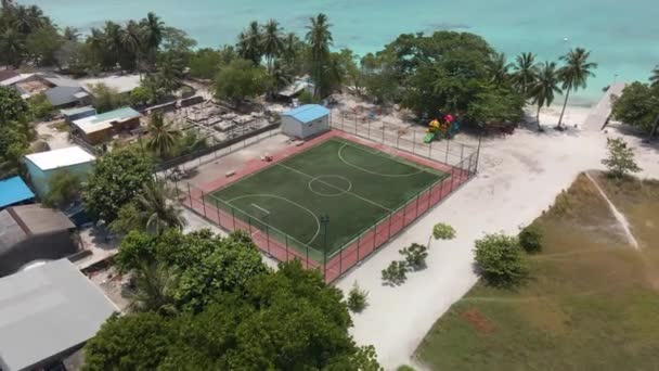 Drone Flying Beach Football Field Turquoise Water Ocean Green Trees — Video
