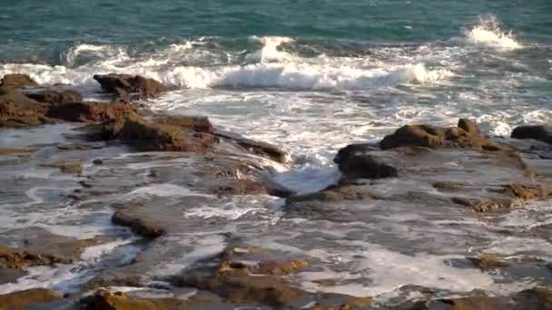 Waves Breaking Rocky Beach Cliffs Low Tide Slow Motion — Stock Video