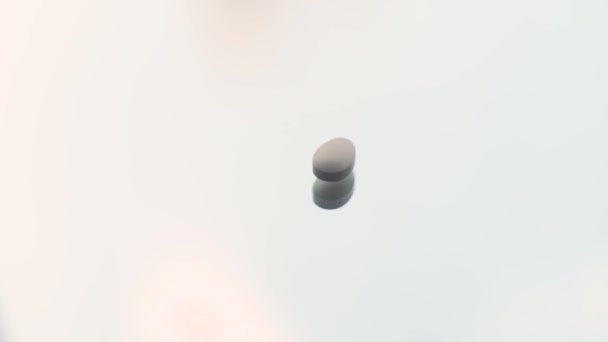 One Pill Spinning Table White Background Space Text Closeup — 비디오