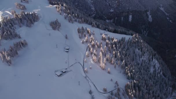 Remote Cabins Alpine Mountain Slope Winter Sunrise Aerial — Stock Video