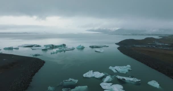 Floating Icebergs Cold Dreary Ocean Landscape Iceland Aerial — Video