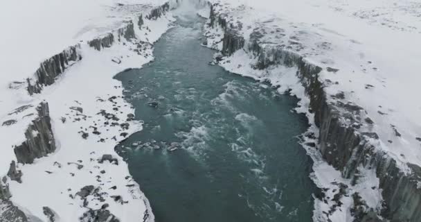 Powerful Dettifoss Waterfall Snow Iceland Landscape Aerial Tilt Reveal — Vídeo de Stock