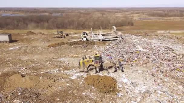 Industrial Tractor Preparing Push Piles Garbage Landfill Aerial View — 비디오