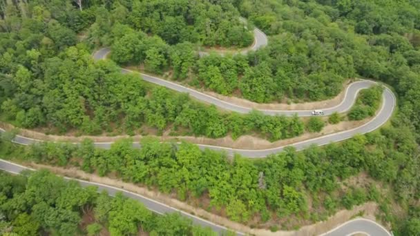 Driving Steep Mountain Road Numerous Hairpin Bends Wide Angle Aerial — Stockvideo