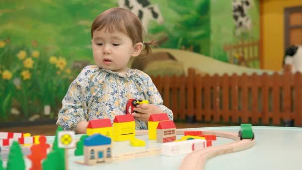 Year Old Toddler Girl Playing Toy Cars Tiny Town Set — Video