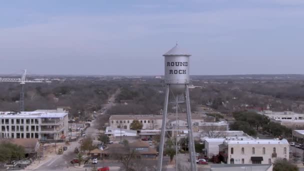 Wide Aerial Pan Silver Water Tower Downtown Rock Texas — Stock Video