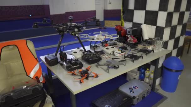 Drones Uav Aircraft Neatly Organised Bench Indoors Vocational High School — Stock Video