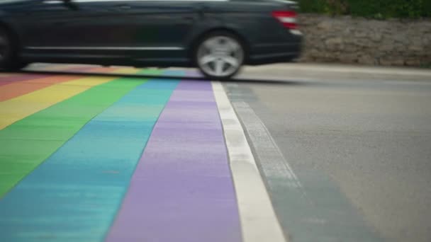 Cars Drive Rainbow Cross Walk Slowmotion People Walk Background — Stock Video