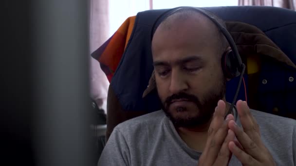 Middle Aged Asian Man Listening Music Headphones Casually Sits Home — Vídeo de Stock