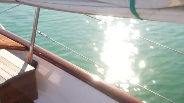 Boat Sailing Ocean Glimmers Light Water Flows — Video