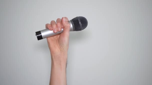 Man Hand Raising Microphone Podcast Speeches Concept — Stock Video