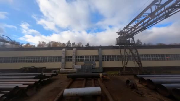 Aerial Worker Fabricating Steel Pipe Factory Yard Crane Loading Metal — Vídeos de Stock