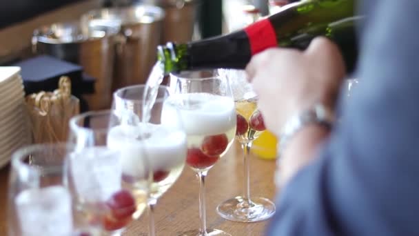 Person Pours Champagne Glasses Restaurant — Stock Video