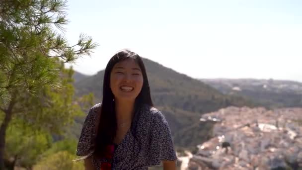 Happy Young Japanese Girl Laughing Camera Top Mountain — Stock video