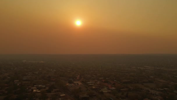 Aerial View Forest Fire Haze Covering Sun Town Usa Reverse — ストック動画