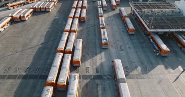 Metro Buses Parked Station Aerial Drone Shot Flying Orange Buses — Stock Video