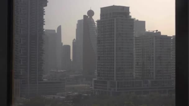 Dubai Cityscape View Glass Elevator Going Misty Skyline Evening Sun — Stock videók