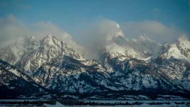 Time Lapse Grand Tetons Bergketen Zonnige Winterdag Wolken Boven Pieken — Stockvideo