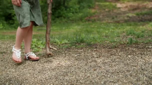 Female Wearing Green Dress Hiking Using Natural Stick Walking Pole — Stock Video