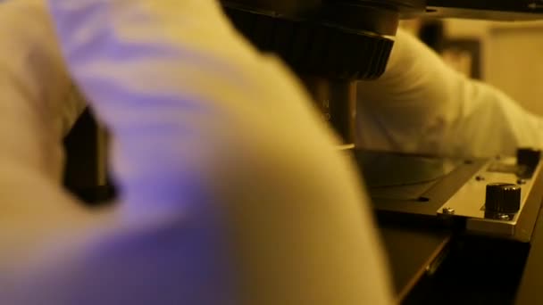 Close Hands Scientist Handling Microscope Research Microchip — Video