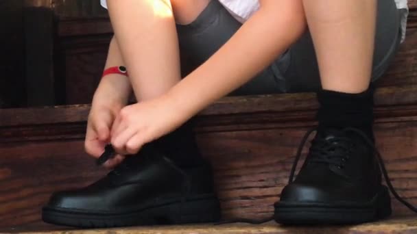 Boy Tying Shoes School While Sitting Steps Hands Legs Feet — Stockvideo