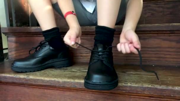 Boy Tying Shoes School While Sitting Steps Hands Legs Feet — Stockvideo