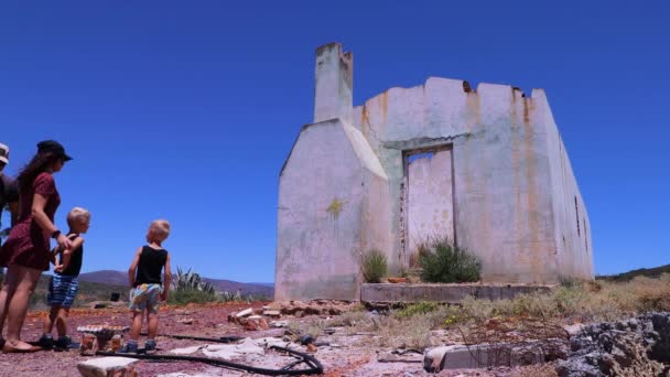 Two Small Boys Throw Rotten Eggs Abandoned Farm Building Parents — ストック動画